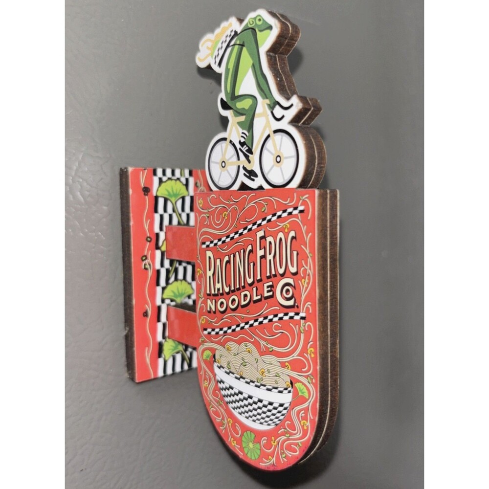 Meow Wolf Racing Frog Magnet NEW